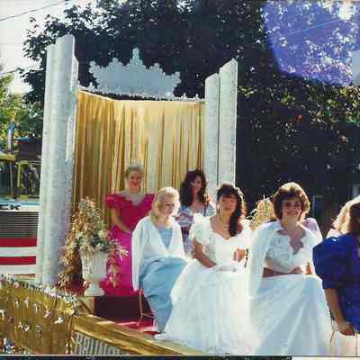 A color photograph of the Teen Queens on the float.