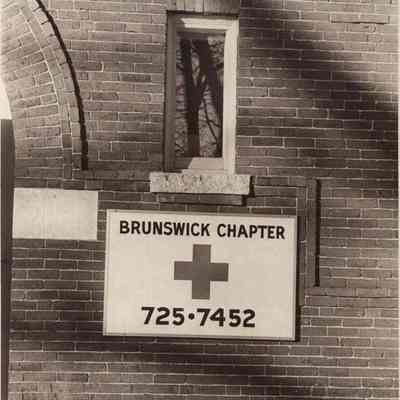 A photo view of the Red Cross sign. 12/27/1978.