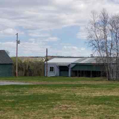 Farm building, Meddybemps, Maine: An old drive shed and outbuilding serves as storage for farming the land around Meddybemps,