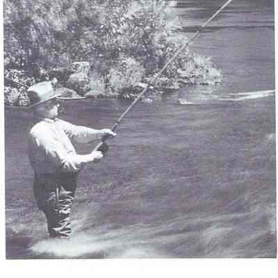 Ralph Higgins fishing the Dodge Place pool on the Dennys River in the 1930's: Reproduced from "Salmon on the Dennys 1786-1988" by Ed Bartlett and Ray Robinson.