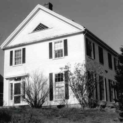 South end of the T.W. Allan House in Dennysville, Maine.: View of the end the T.W. Allan House with the icehouse and barn at left.