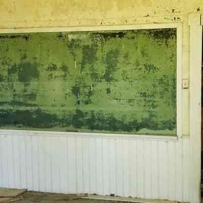East Ridge School House, Cathance Township, Maine: A green blackboard still hangs on the wall as reminder of lessons learned and instruction given.