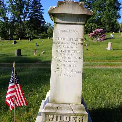 Elijah A. Wilder Family Gravestone, Dennysville Town Cemetery: Gravestone inscriptions for Elijah A. Wilder, his first wife Elizabeth H., and second wife Sarah G., under the banner "Gone Home".
