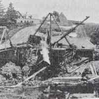          Construction of the new cement bridge over Hobart Stream in 1926; The old iron bridge is to the left, and Nat Smith's farm is in the background.
   
