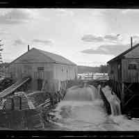          Lincoln Mills on the Dennys River; Situated on the Lincoln Mill Pond Dam, in a photograph taken by John P. Sheahan c. 1885 from the Upper, or upstream, Bridge over the Dennys River.
   