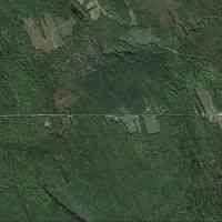          Cooper, Maine, on Google Earth; Satellite view of the sites of the former Cooper Saw Mill, Post Office at the sharp corner on the left, to the Evergreen Cemetery on the right in this Google Earth image accessed on 08-12-2023.
   