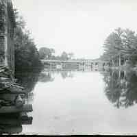         Lower Bridge over the Dennys River, c. 1890; View of the Lower Bridge over the Dennys River as seen from behind Gardner's store in Dennysville, Maine.  Photograph by John P. Sheahan, courtesy of the Tides Institute, Eastport, ME.
   