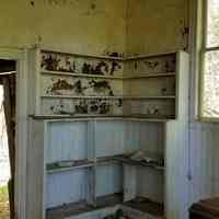          East Ridge School House, Cathance Township, Maine; Empty shelves once held books and other teaching tools.
   