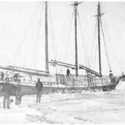 Schooner Jennie French caught in the ice at Allan's Wharf, on the Dennys River, Edmunds, Maine