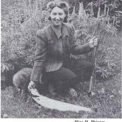Mina Phinney with a freshly caught salmon on the Denny River: Reproduced from "Salmon on the Dennys, 1786-1988" by Ed Bartlett and Ray Robinson.