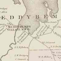          Map of Meddybemps, Maine in 1881; Detail of the Colby Atlas map of Meddybemps, Maine in 1881 shown on p 14 of the Atlas.  Two schoolhouses, marked S.H., are located on either side of the village, where the Dennys River flows south from Meddybemps Lake.
   