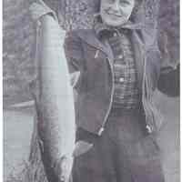          Beatrice Wilder displays her salmon catch on the Dennys River; Reproduced from 