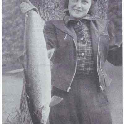 Beatrice Wilder displays her salmon catch on the Dennys River: Reproduced from "Salmon on the Dennys, 1786-1988" by Ed Bartlett and Ray Robinson.