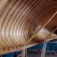          Inside view of a Passamaquoddy made birchbark canoe; View of the ribs and interior framework of a birchbark canoe made by Steve Cayard and David Moses Bridges in 2003, at the Wabanaki Museum in Indian Township, Maine
   