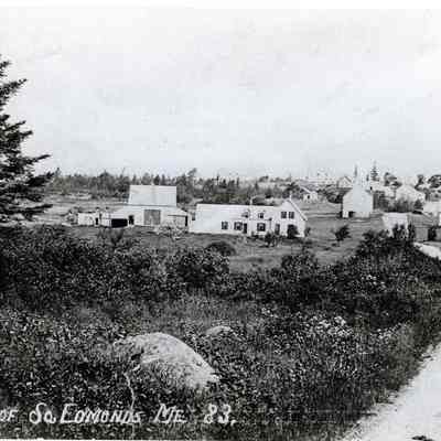 View of South Edmunds, Maine: Keith Kilby built his house on the site of the former E.I White Company store, the two story white building on the crest of the crest of the hill in the distance.