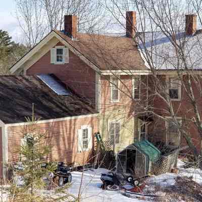 Peter E. Vose House, Dennysville, Maine: Rear view of the Peter E. Vose House on Harrison Avenue, Dennysville, Maine.  After serving as the home of the Vose and Mahar families, the house was later occupied by the Corey family in the late 20th century.
