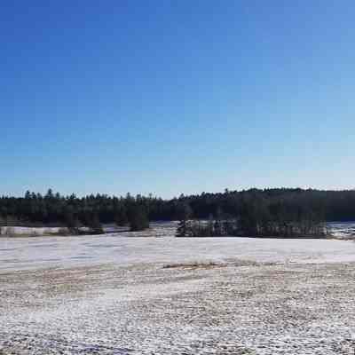 Hay fields in winter overlooking the Snare Meadow Marsh on Hobart Stream, Edmunds, Maine