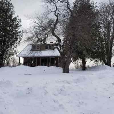 View of Everett and Flora Case Grant's house and barn, Station Road, Marion, Maine.