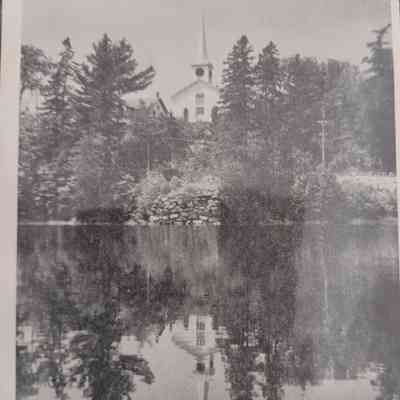 Dennysville-Edmund Congregational Church: Taken from the Edmunds side of the Dennys River, this image shows the church reflected in the calm waters of the river.
