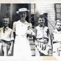          Sunday Morning at the Vestry, Dennysville, Maine, in the 1940's; From left to right: George Stevens, Walter Leighton, Edith Gardner Merriam, --Munson, Keith Curtis
   