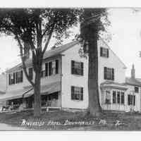          Riverside Hotel, Dennysville, Maine,; The Riverside Inn/Hotel sported several large awnings for guests to enjoying the shade on Water Street in the early twentieth century.  John Allan's store is to the left.
   