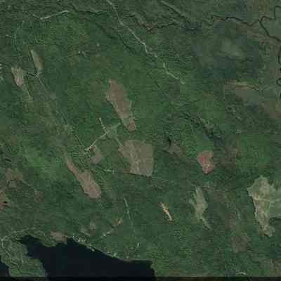 East Ridge Road, Cooper, Maine on Google Earth: Two schoolhouses and a cemetery were located on the East Ridge Road as it bends between Little Cathance Lake, Dead Stream and the Dennys River, in this satellite image from Google Earth, accessed on 08-12-2023.