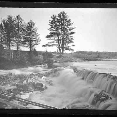 Lincoln Pond Dam in Dennysvlle, Maine: Water overflows the Lincoln Pond Dam on the Dennys River during a freshet, in a photograph by John P. Sheahan of Edmunds, Maine.