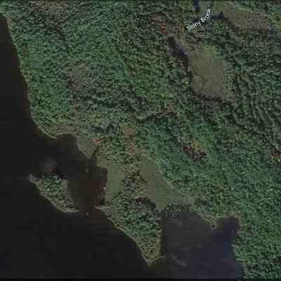 Stony Brook on Google Earth: Stony Brook, the original outlet of Meddybemps Lake, is visible in this image from Google Earth as a narrow inlet to the northeast of a small island above Eaton Point.