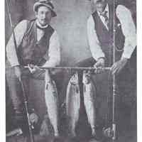          Two anglers, father and son, from Rye, New Hampshire with Dennys River salmon in the early 1900's; Reproduced from 