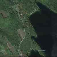          Cooper, Maine, on Google Earth; Satellite image of Murphy Point, and the site of an early schoolhouse and cemetery on the road (Rte. 191) running beside Meddybemps Lake in Cooper, Maine, accessed on Google Earth on 08-12-2023.
   