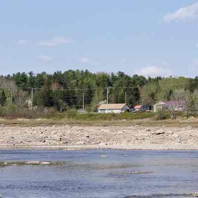 Corn Hill from the Dennys River: View of Corn Hill and U.S. Route 1 from the Dennys River at low tide.