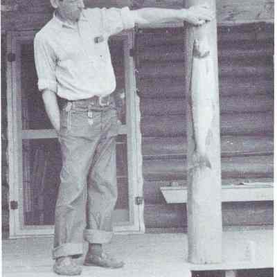 Charlie Sylvia surveys his salmon.: Reproduced from "Salmon on the Dennys 1786-1988" by Ed Bartlett and Ray Robinson.