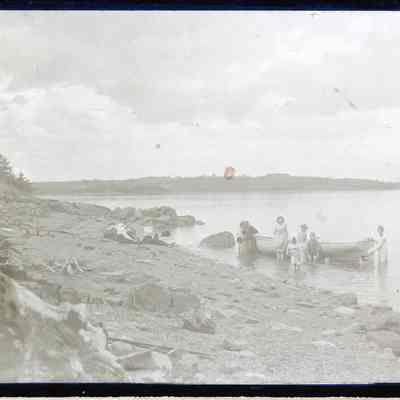 Picnic at Hurley Point, c. 1902: Alice Lincoln and Lavada Jones with baby Louis on shore, while in the water are Donald, Ruth Kilby, Mary Lincoln, Julia in the boat, Pricilla and Leigh, Edith swimming and Ethel at the end of the boat.
