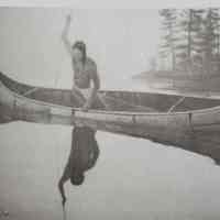          A lone Wabanaki fisherman poised to spear a fish from his birchbark canoe.; Reproduced with permission from 