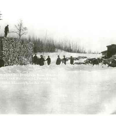The Big Load of pulpwood arriving at the Great Works railroad siding: The winning team with the biggest load of wood hauled by on pair of horses at the Higgin's Brother's siding at the Great Works, in the winter of 1922-23.