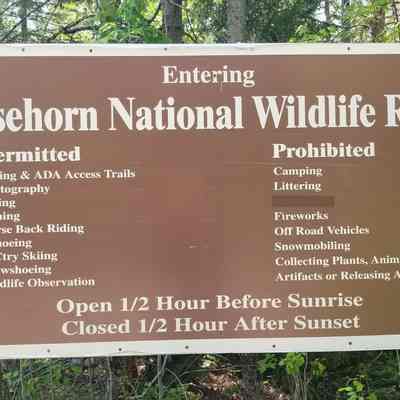 Moosehorn National Wildlife Refuge Signage at the head of the South Trail in Edmunds, Maine.: Signage with permissions and prohibitions on this Federal Wildlife Refuge in Edmunds, Maine