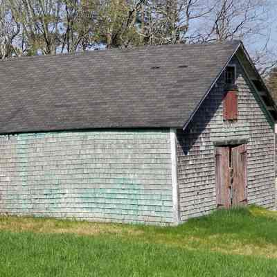 John Kilby's Barn, Dennysville, Maine: View of the barn behind the John Kilby House in Dennysville, Maine.  While the house faces Water (now Main) Street, the side of the house, including the barn is built into the hill on Harrison Avenue.