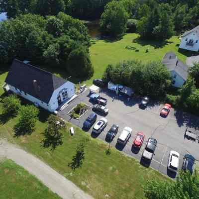 Meddybemps Town Hall, 2023: Aerial view of the Meddybemps Post Office and Community Center, courtesy of Jeffrey Orchard.