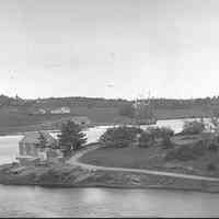          Allan's Wharf and Dennys River 1881; Detail view of T.W. Allan's Wharf in Edmunds and his shipyard on Foster Lane across the Dennys River in Dennysville, Also visible along Foster Lane are the John Sheahan House , behind the spars of the schooner, and the Bela Reynolds House at the end of Foster's Lane.
   