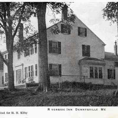Another view of the Riverside Inn, this one taken through a screen.