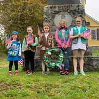          Girl Scout honoring the fallen in front of the Soldier's Monument on Memorial Day, 2019.; Photograph by Coleen Smith
   