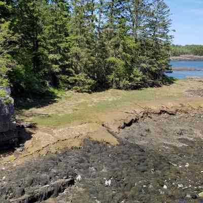 Site of Isaac Hobarts Saw and Grist Mill at Little Falls: Stone bridge abutments date from 1902 when the old wooden bridge across Hobart Stream was replaced with a 100-foot iron span, where Isaac Hobart's tide mill once powered a saw and grist mill.