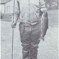          Carroll Fisher and a four pound trout caught on the Dennys River; Reproduced from 