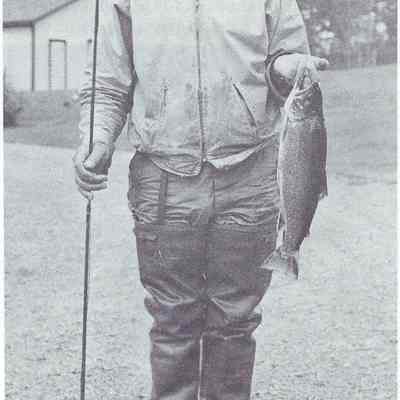 Carroll Fisher and a four pound trout caught on the Dennys River: Reproduced from "Salmon on the Dennys 1786-1988" by Ed Bartlett and Ray Robinson.
