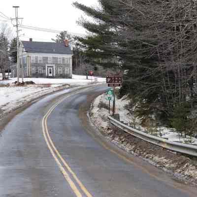 Looking across the Falls Bridge from Edmunds to Dennysville with the Mariner Wilder House in the distance.