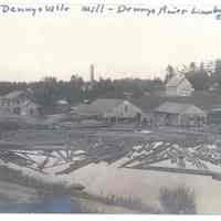          Mill Pond of the Dennys River, after 1907; Logs float placidly in the mill pond, once owned by the Lincoln family but, sold to the Dennysville Lumber Company in 1894. The tall stack of the waste burner was installed on the Edmunds side of the river after a disastrous fire left the mill beside the river in ashes in April, 1907.
   