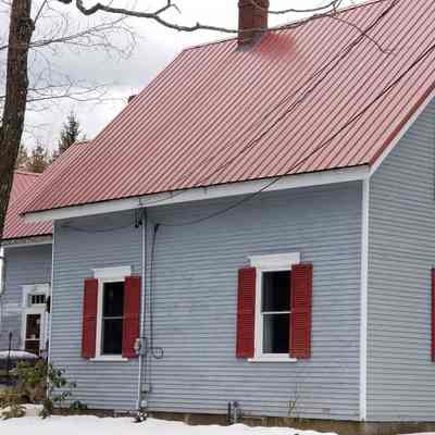 Gardner-Hobart House in winter on the Lane in Dennysville, Maine