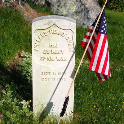 Gravestone of Wallace Henry Chase: William Henry Chase was veteran of the Spanish-American War interred in the Dennysville Town Cemetery.  Beside him are buried Freda Blackwood and her husband, Bertie.