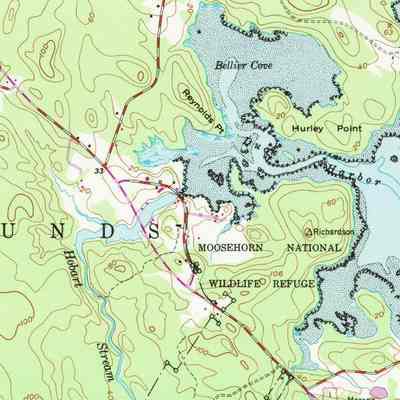 U.S. Route 1 in Edmunds, Maine.: Both the old and newly built bridges of U. S. Route 1 across Hobart Stream are shown on revised edition of an older, 1949 U.S.G.S. topographical map of Edmunds, marking the newly built portion of the highway in purple, and the older route in red.