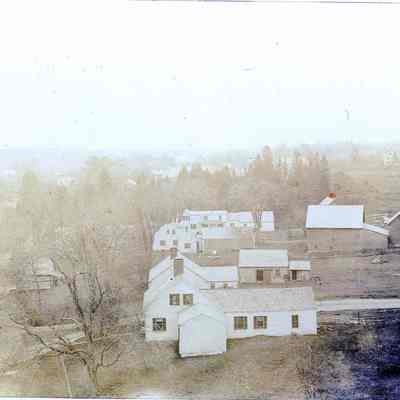 Houses on Meetinghouse Hill, Dennysville Maine, c. 1900: Seen from the Church's steeple belfry are John Smith's former tavern, (site of the current Lincoln Memorial Library,) the William Kilby Jr. house across King Street, with Gardner family houses down the hill.